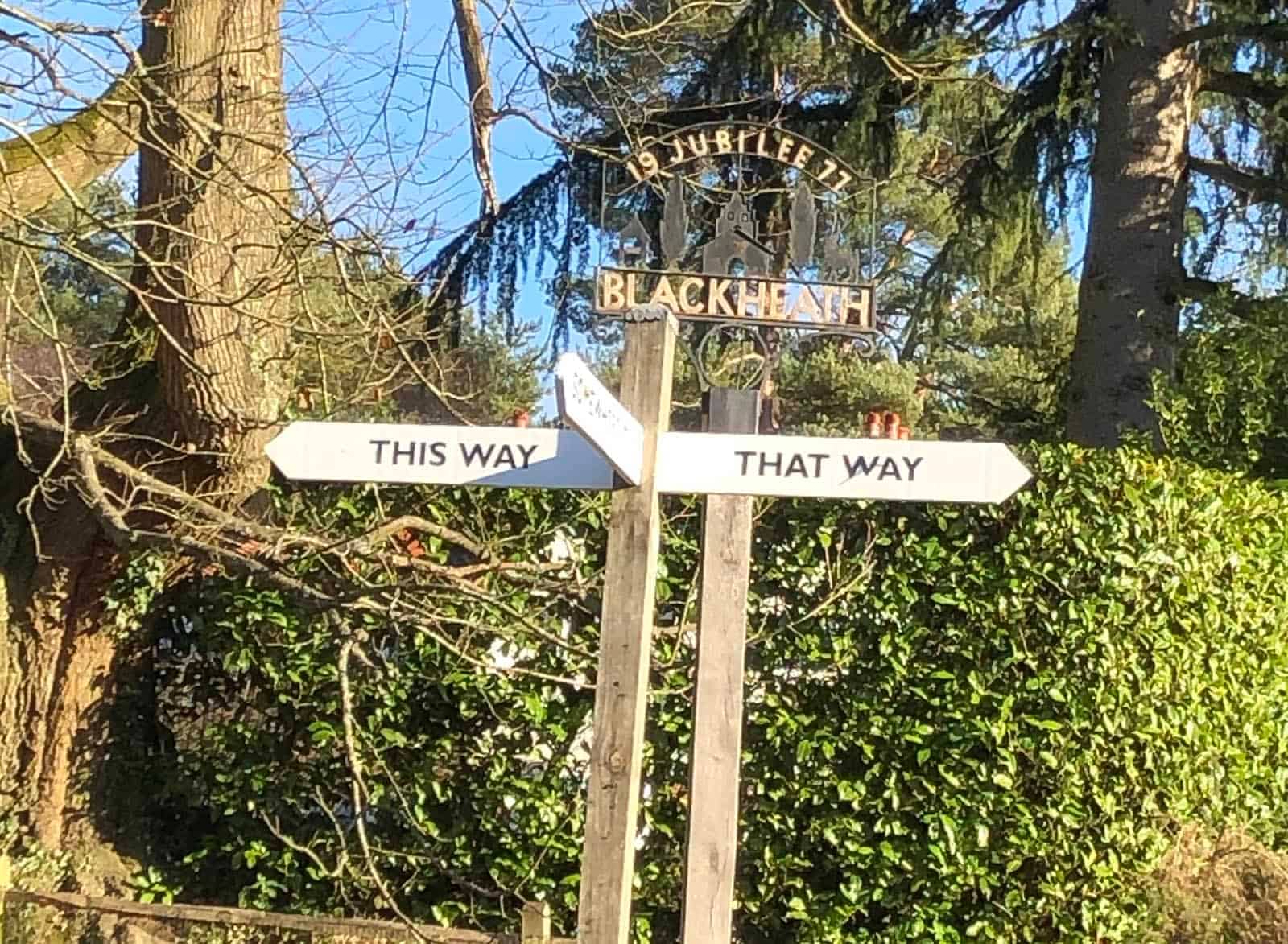 This way that way fingerpost sign