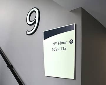 Wayfinding signs in the stairwells in Gatehouse Apartments Southampton