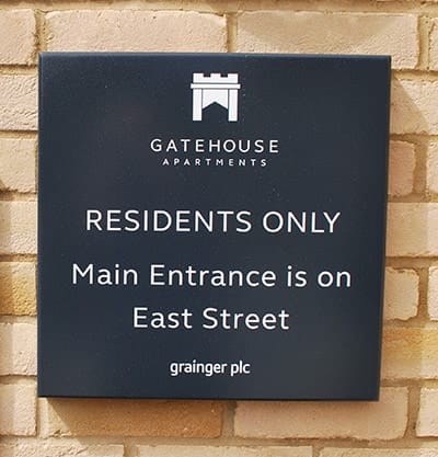 Residents entrance sign at Gatehouse Apartments