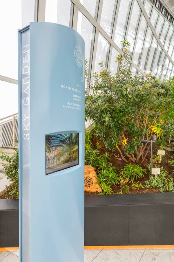 Totem sign located within the Sky Garden with an integrated digital screen