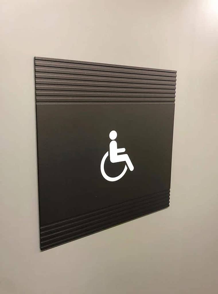 Disabled toilet sign design in Marble Arch Place