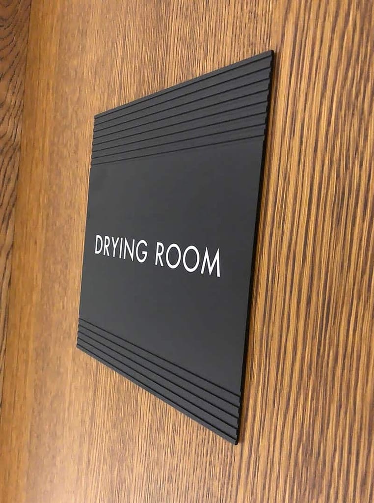 Room identification sign for Bryanston Apartments
