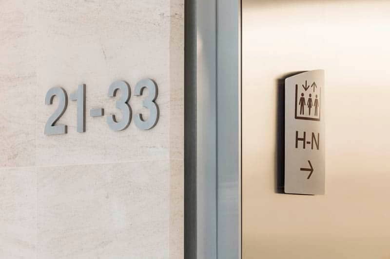 Front of house wayfinding signs in 20 Fenchurch St