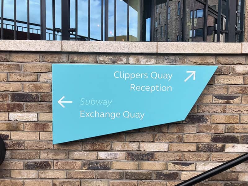 Direction sign applied to a wall in the Clippers Quay development