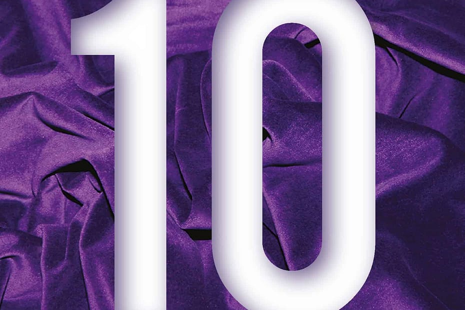 Large figure 10 in white letters against a purple velvet background