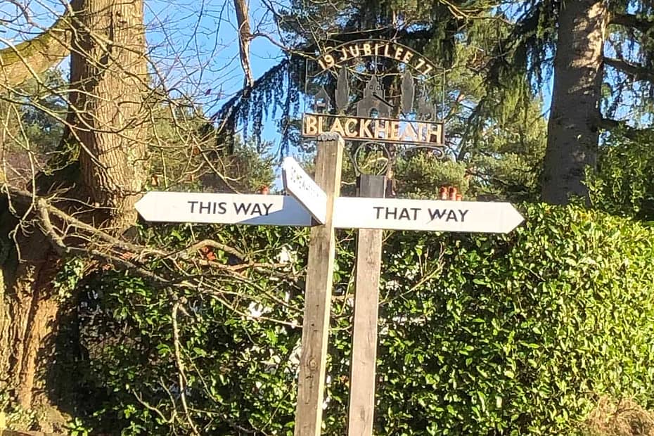 This way that way fingerpost sign