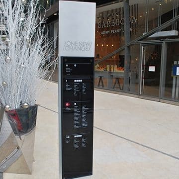 Totem sign at entrance to One New Change Shopping Centre